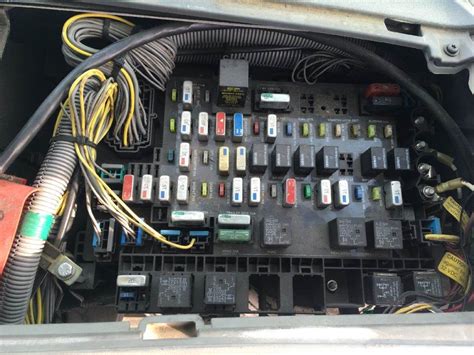Open up the glove compartment and remove the screws that keep it in place. . 2006 freightliner m2 fuse box location